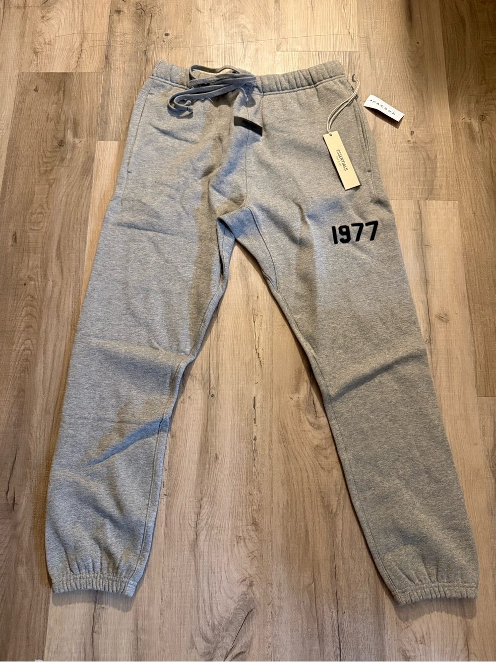 Essentials Light Gray Sweatpants with 1977 Graphic